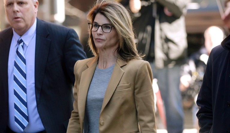 Lori Loughlin arrives at federal court in Boston on Wednesday, April 3, 2019, to face charges in a nationwide college admissions bribery scandal.