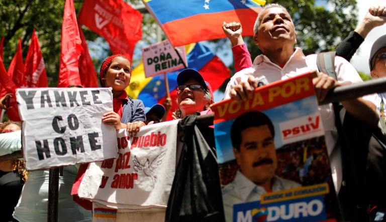 Backers of Venezuela's President Nicolas Maduro attend a rally in support of the socialist leader in Caracas, Venezuela, Saturday, April 6, 2019. Rival political factions are taking the streets across Venezuela in a mounting struggle for control of the crisis-wracked nation recently hit by crippling blackouts.