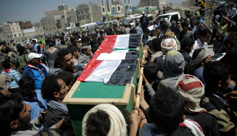 Mourners carry the coffin of a victim of an explosion during a funeral procession in Sanaa, Yemen, Wednesday, April 10, 2019. Residents of the Yemeni capital recounted on Monday the horror of a large explosion a day earlier that killed more than a dozen civilians, including seven children, and wounded more than 100 â the cause of which is still unclear.