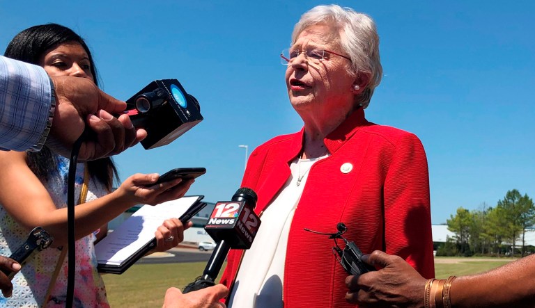 Alabama Gov. Kay Ivey discusses a bill that would virtually outlaw abortion in the state while visiting a car factory at Montgomery, Ala., on Wednesday, May 15, 2019. Ivey, who has described herself as opposing abortion, said she has not yet reviewed the legislation or made a decision on whether to sign it.