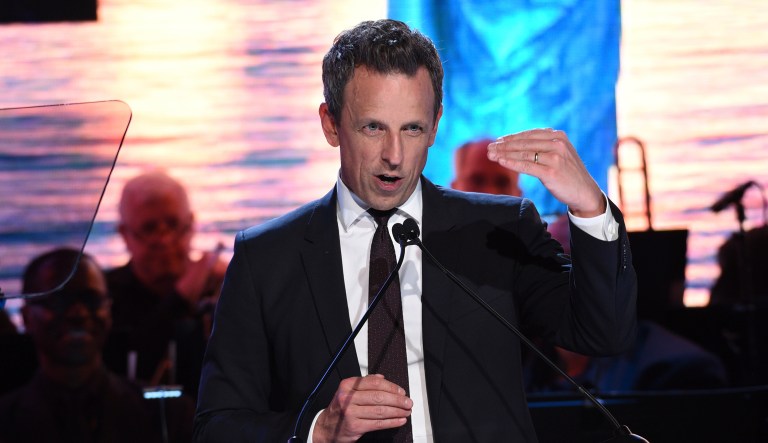 Host Seth Meyers speaks at the Statue of Liberty Museum opening celebration at Battery Park in New York.