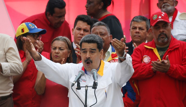 Venezuela's President Nicolas Maduro speaks to supporters outside Miraflores presidential palace in Caracas, Venezuela, Monday, May 20, 2109. Maduro is celebrating the anniversary of his disputed re-election amid a growing humanitarian crisis and political upheaval.