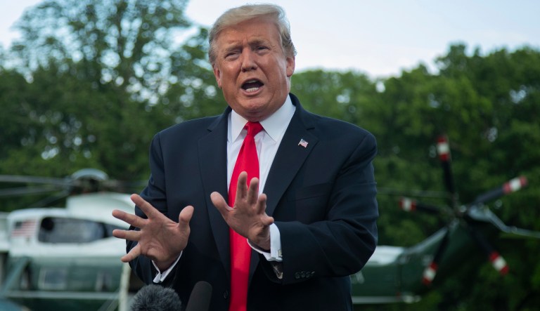 In this May 20, 2019, photo, President Donald Trump speaks to reporters on the South Lawn before leaving the White House in Washington. Three weeks have passed since Trump and Democratic congressional leaders agreed to work together on a $2 trillion package to invest in roads, bridges and broadband.