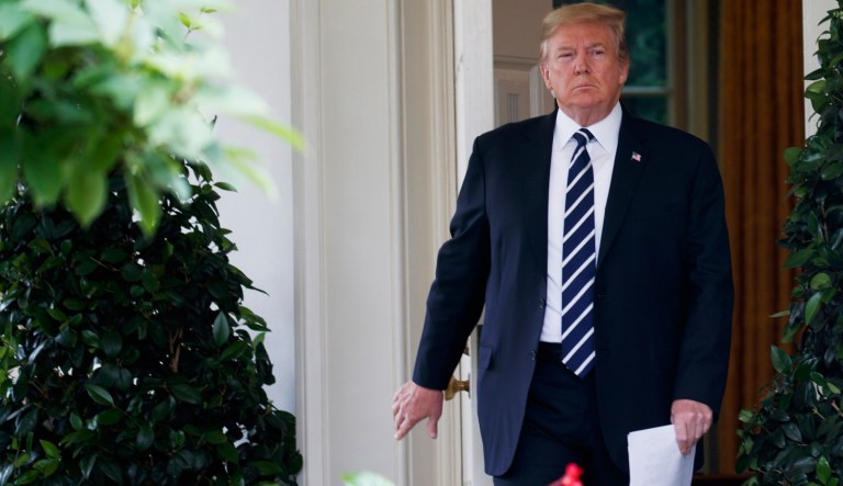 President Trump walks out of the Oval Office to deliver a statement in the Rose Garden of the White House in D.C.