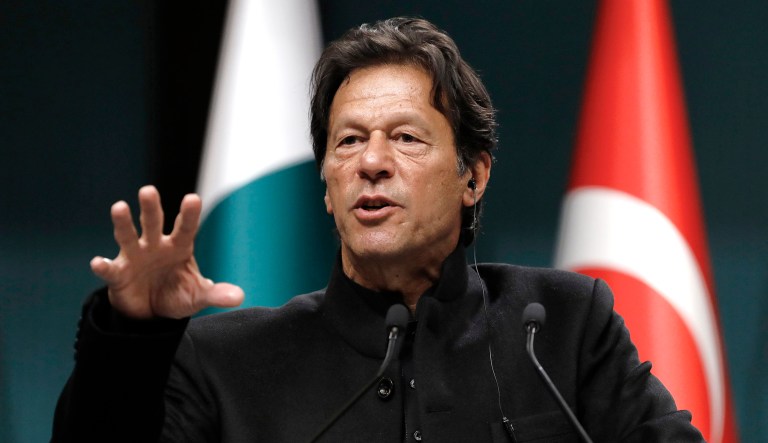 Pakistani Prime Minister Imran Khan speaks at a news conference in Ankara, Turkey.