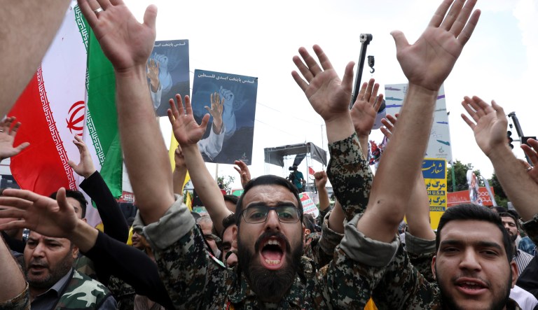 A group of members of Basij paramilitary force, affiliated to the Revolutionary Guard, chant slogan during the annual Quds, or Jerusalem Day rally in Tehran, Iran, Friday, May 31, 2019. Thousands of Iranians rallied Friday to mark Quds, or Jerusalem Day, which will see demonstrations across the Mideast as the Trump administration tries to offer an Israeli-Palestinian peace plan.