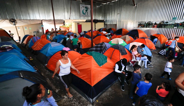 Tents fill a shelter used mostly by Mexican and Central American migrants who are applying for asylum in the U.S., on the border in Tijuana, Mexico.