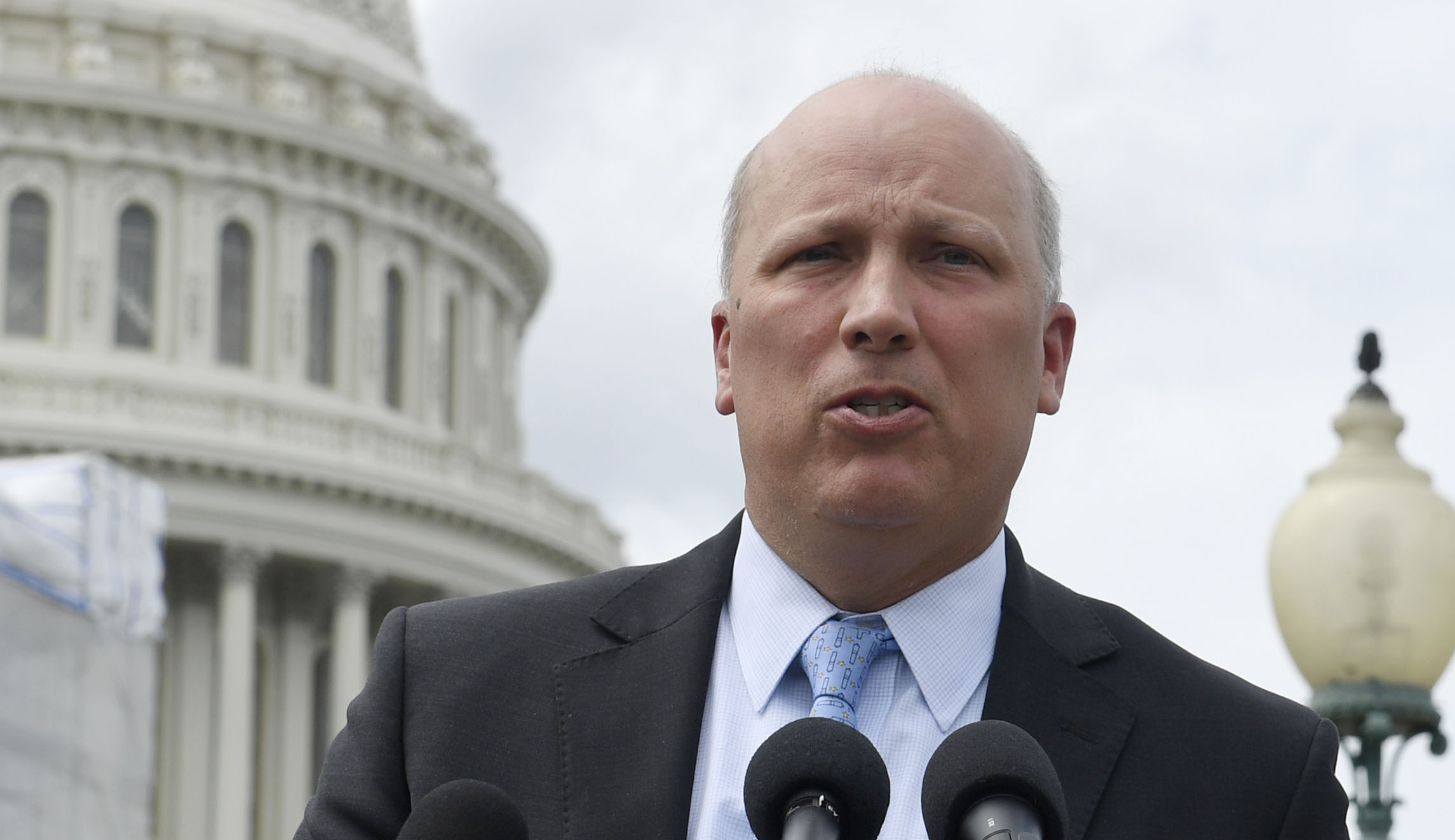 Rep. Chip Roy, R-Texas, center, speaks in Washington.