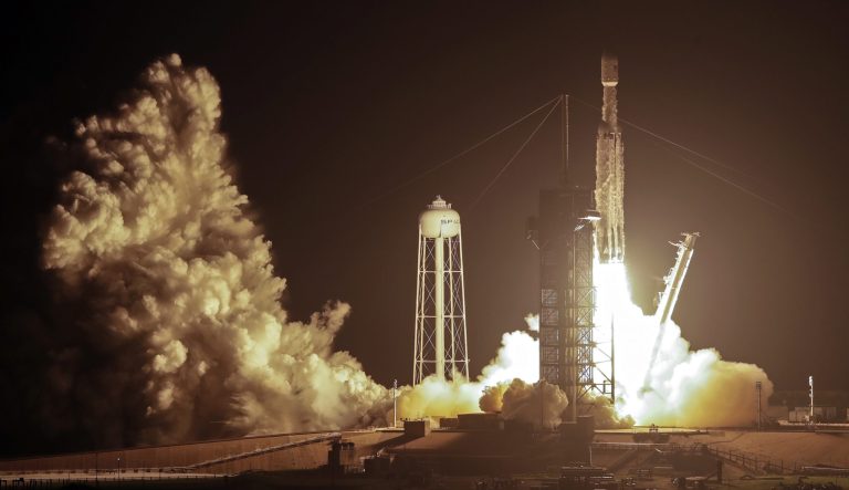 A SpaceX Falcon heavy rocket lifts off from pad 39A at the Kennedy Space Center in Cape Canaveral, Fla., early Tuesday, June 25, 2019. The Falcon rocket has a payload military and scientific research satellites. 