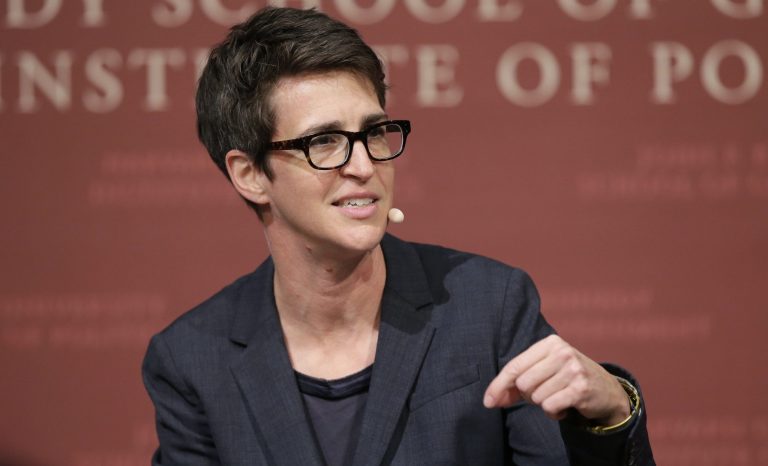 In this Oct. 16, 2017 photo, MSNBC television anchor Rachel Maddow, moderates a panel on the campus of Harvard University, in Cambridge, Mass. 