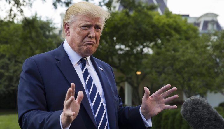President Donald Trump speaks with reporters on the South Lawn of the White House before departing, Friday, July 19, 2019, in Washington. 