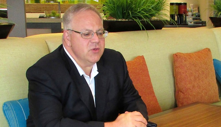 Interior Secretary David Bernhardt talks to a reporter in Elko, Nevada.