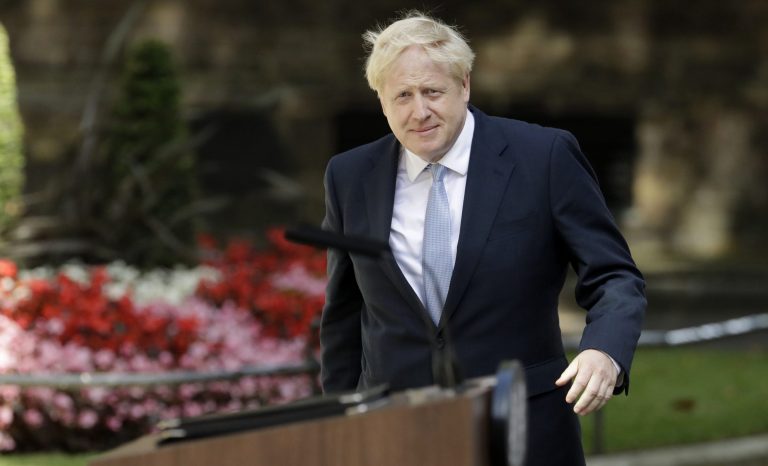 Britain's new Prime Minister Boris Johnson arrives to make a speech outside 10 Downing Street, London, Wednesday, July 24, 2019. 