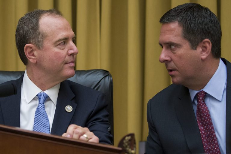 House Intelligence Committee Chairman Adam Schiff, D-Calif., and Rep. Devin Nunes, R-Calif, ranking member of the House Intelligence Committee talk before hearing testimony by former special counsel Robert Mueller before the House Intelligence Committee hearing on his report on Russian election interference, on Capitol Hill, Wednesday, July 24, 2019 in Washington.