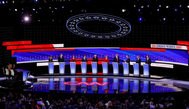 From left, Marianne Williamson, Rep. Tim Ryan, D-Ohio, Sen. Amy Klobuchar, D-Minn., South Bend Mayor Pete Buttigieg, Sen. Bernie Sanders, I-Vt., Sen. Elizabeth Warren, D-Mass., former Texas Rep. Beto O'Rourke, former Colorado Gov. John Hickenlooper, former Maryland Rep. John Delaney, and Montana Gov. Steve Bullock participate in the first of two Democratic presidential primary debates hosted by CNN Tuesday, July 30, 2019, in the Fox Theatre in Detroit. 