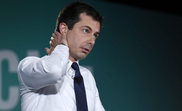 Democratic presidential candidate Pete Buttigieg, mayor of South Bend, Ind., reflects on the news of a mass shooting in El Paso, Texas, during an appearance at an American Federation of State, County and Municipal Employees public service forum in Las Vegas, Saturday, Aug. 3, 2019. 
