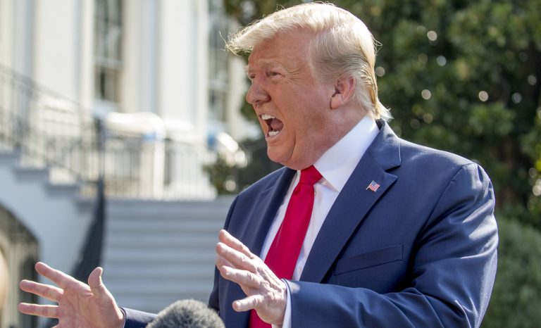 President Donald Trump speaks to members of the media on the South Lawn of the White House in Washington, Wednesday, Aug. 7, 2019.