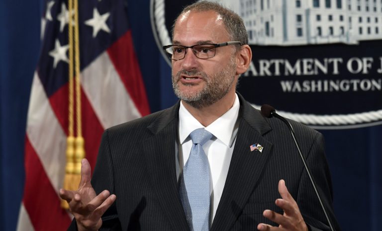 In this July 19, 2019 photo, acting Director of the Bureau of Prisons Hugh Hurwitz speaks during a news conference at the Justice Department in Washington. 