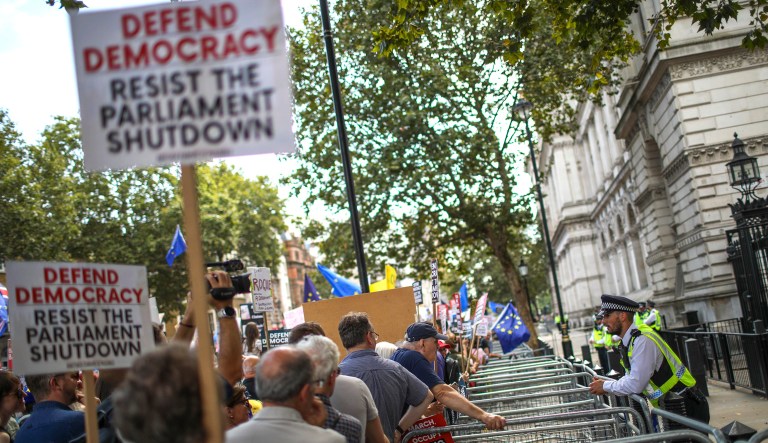 Anti-Brexit protesters from "Stop the Coup" Movement continue to protest outside Downing Street in central London, Saturday.