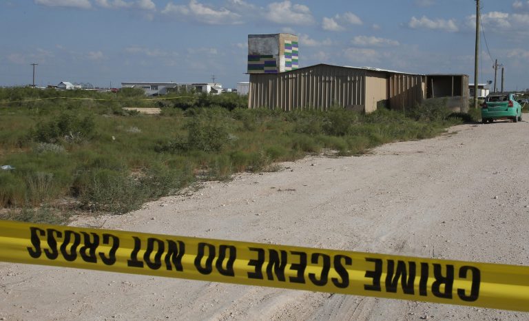 Crime scene tape surrounds the home of Seth Aaron Ator, the alleged gunman in a West Texas rampage Saturday, on Monday, Sept. 2, 2019, near Odessa, Texas. 
