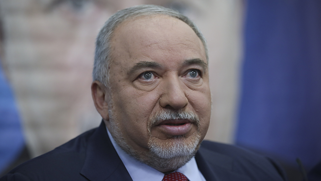 Netanyahu on brink of losing grip on power as exit polls show tight race in Israeli elections