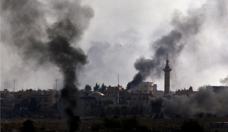 In this photo taken from the Turkish side of the border between Turkey and Syria, in Akcakale, Sanliurfa province, southeastern Turkey, smoke billows from targets inside Syria during bombardment by Turkish forces Thursday, Oct. 10, 2019. 
