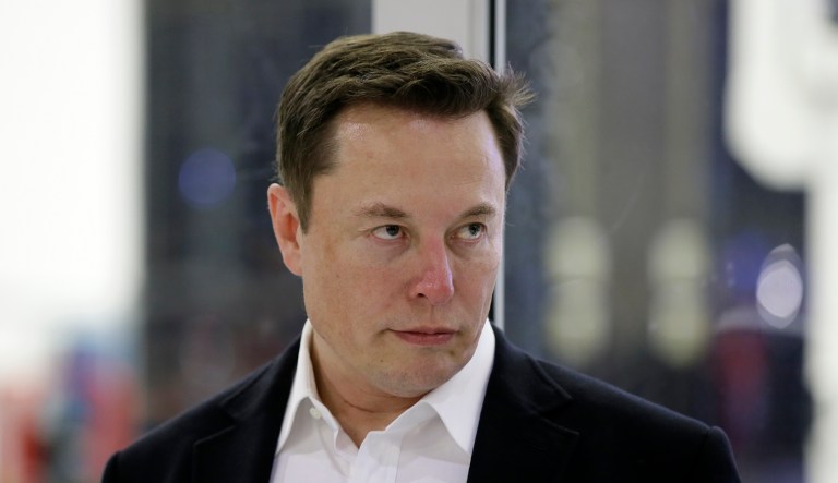 SpaceX chief engineer Elon Musk listens to a question from the media about the progress regarding flying astronauts to and from the International Space Station, from American soil, as part of the agency's commercial crew program at SpaceX headquarters, in Hawthorne, California, Thursday, Oct. 10, 2019. 