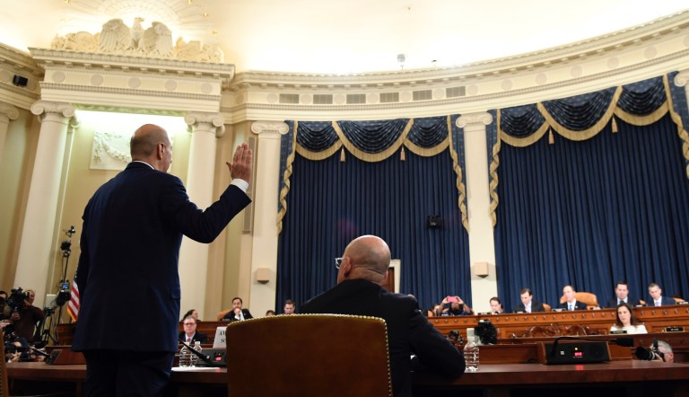 U.S. Ambassador to the European Union Gordon Sondland is sworn in to testify before the House Intelligence Committee on Capitol Hill in Washington, Wednesday, Nov. 20, 2019, during a public impeachment hearing of President Trump's efforts to tie U.S. aid for Ukraine to investigations of his political opponents.