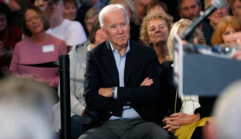 Democratic presidential candidate former Vice President Joe Biden waits to speak to local residents during a bus tour stop, Tuesday, Dec. 3, 2019, in Mason City, Iowa.