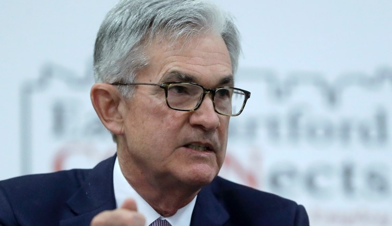 Fed sees strong growth and rapidly falling unemployment but no rate hikes for years