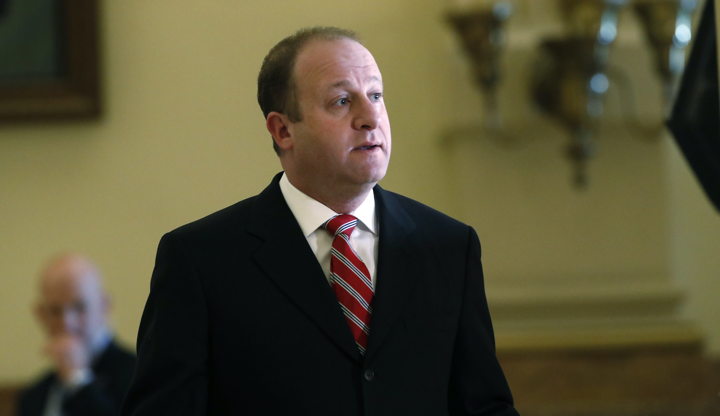 Polis extends stay-at-home order until April 26