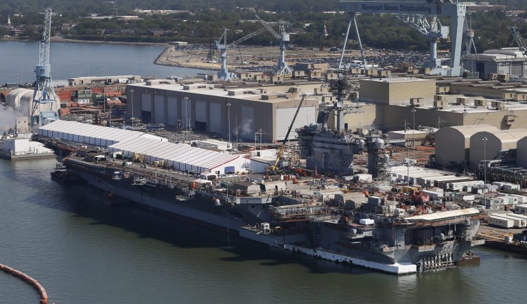 The nuclear powered aircraft carrier USS Abraham Lincoln sits pier side at Newport News Shipbuilding in Newport News, Va., Wednesday April 27, 2016. 