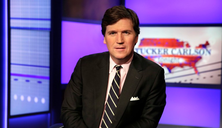 Tucker Carlson, host of "Tucker Carlson Tonight," poses for photos in a Fox News Channel studio, in New York, March 2, 2107.