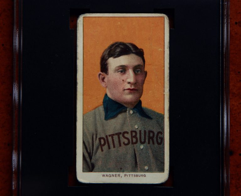 A Honus Wagner baseball card is pictured.