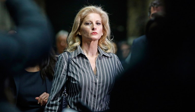 Summer Zervos leaves Manhattan Supreme Court after a hearing in New York. Zervos, a former contestant on "The Apprentice," isn't asking for much in her defamation lawsuit against President Trump. She wants less than $3,000 and an apology for unwanted sexual advances. 