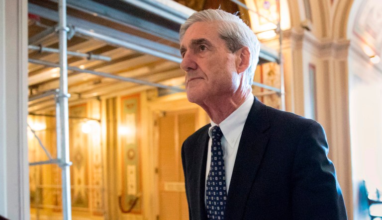 Special counsel Robert Mueller departs after a meeting on Capitol Hill in Washington. 