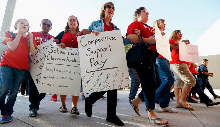 Arizona teachers have voted to walk off the job to demand increased school funding, marking a key step toward a first-ever statewide strike that builds on a movement for higher pay in other Republican-dominant states.