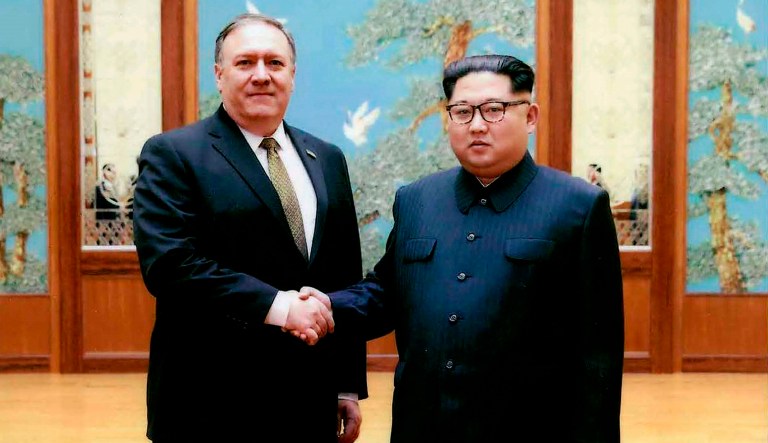 Then-CIA director Mike Pompeo shakes hands with North Korean leader Kim Jong Un in Pyongyang, North Korea, during a 2018 East weekend trip. President Trump revealed more information about Pompeo's secret trip to North Korea, saying Pompeo wasn't supposed to meet with Kim, but that they ended up talking for more than an hour. Pompeo, who won Senate confirmation April 26, to become secretary of state, was the most senior U.S. official to meet a North Korean leader since 2000. 