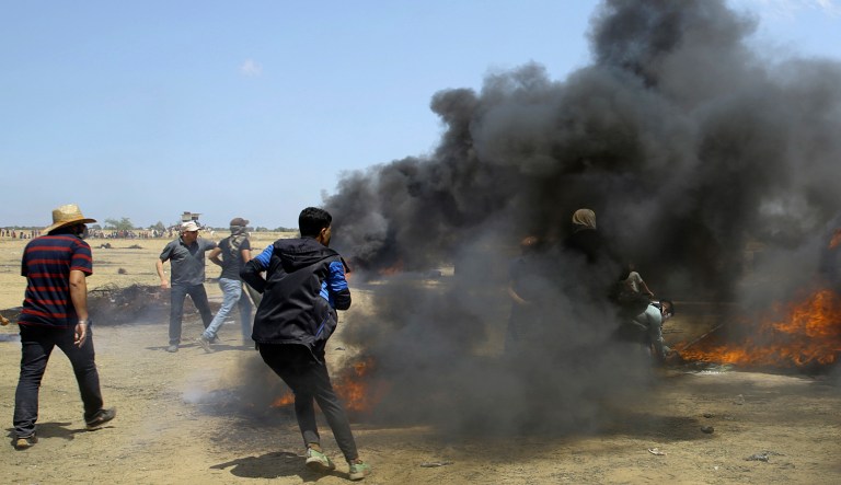 Israeli fire has killed dozens of Palestinians during mass protests along the Gaza border, marking the deadliest day of violence since a devastating 2014 cross-border war and casting a pall over Israel's festive inauguration of the new U.S. Embassy in contested Jerusalem. 