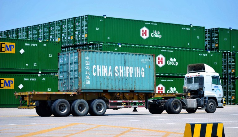 China's government on Wednesday has criticized the latest U.S. threat of a tariff hike as "totally unacceptable" and vowed to retaliate in their escalating trade war. 