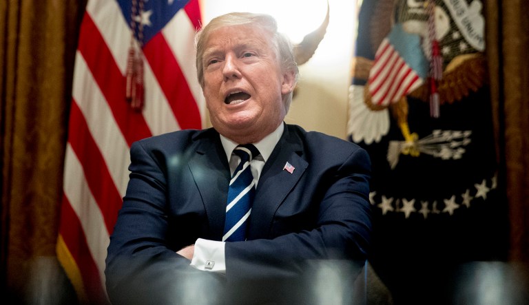 President Trump says he meant the opposite when he said in Helsinki that he doesn't see why Russia would have interfered in the 2016 U.S. elections. 