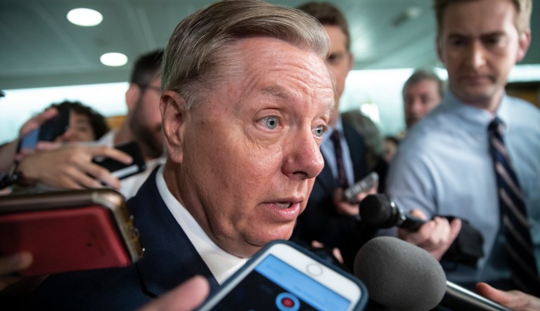 Sen. Lindsey Graham, R-S.C., a member of the Senate Judiciary Committee, responds to reporters after Sen. Jeff Flake, R-Ariz., a member of the committee, called for the FBI to investigate the sexual misconduct claims against Supreme Court nominee Brett Kavanaugh, on Capitol Hill in Washington, Friday, Sept. 28, 2018. Graham says it's going to fall to him to lay out to President Donald Trump why Brett Kavanaugh's Supreme Court confirmation vote has been delayed.