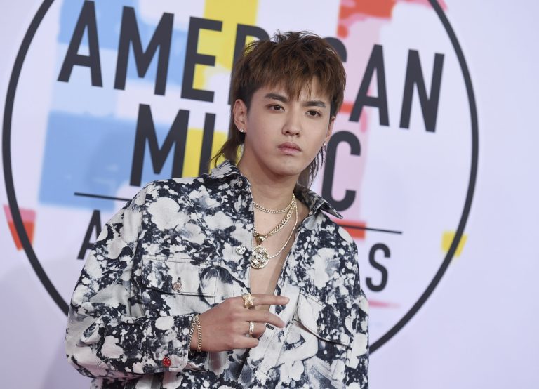 Kris Wu arrives at the American Music Awards on Tuesday, Oct. 9, 2018, at the Microsoft Theater in Los Angeles.