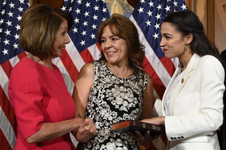 House Speaker Nancy Pelosi of Calif., left, talks with Rep. Alexandria Ocasio-Cortez, D-N.Y., right, and her mother Blanca Ocasio-Cortez, center, during a ceremonial swearing-in on Capitol Hill in Washington, Thursday, Jan. 3, 2019. Voters wish Democrats in the House would be more like Pelosi than the rabble-rouser.