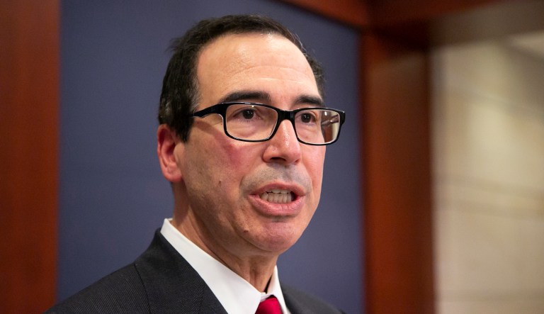 Treasury Secretary Steven Mnuchin speaks to reporters after giving a classified briefing to members of the House of Representatives, telling them that the Trump administration will keep strict U.S. sanctions on the Russian oligarch Oleg Deripaska, on Capitol Hill in Washington, Thursday, Jan. 10, 2019. 