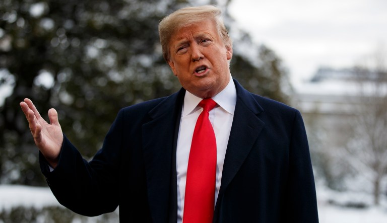 President Trump talks with reporters on the South Lawn of the White House before departing for the American Farm Bureau Federation's 100th Annual Convention in New Orleans, Monday, Jan. 14, 2019, in Washington.