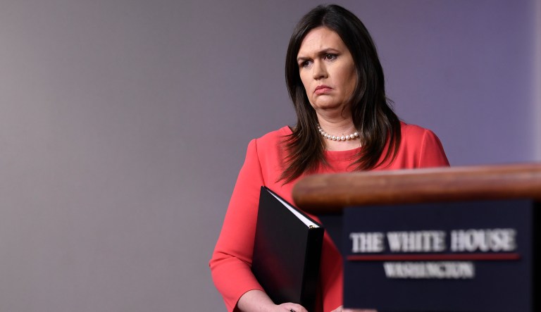 White House press secretary Sarah Sanders listens to a question before taking to the podium during the daily briefing at the White House in Washington, Monday, Jan. 28, 2019.