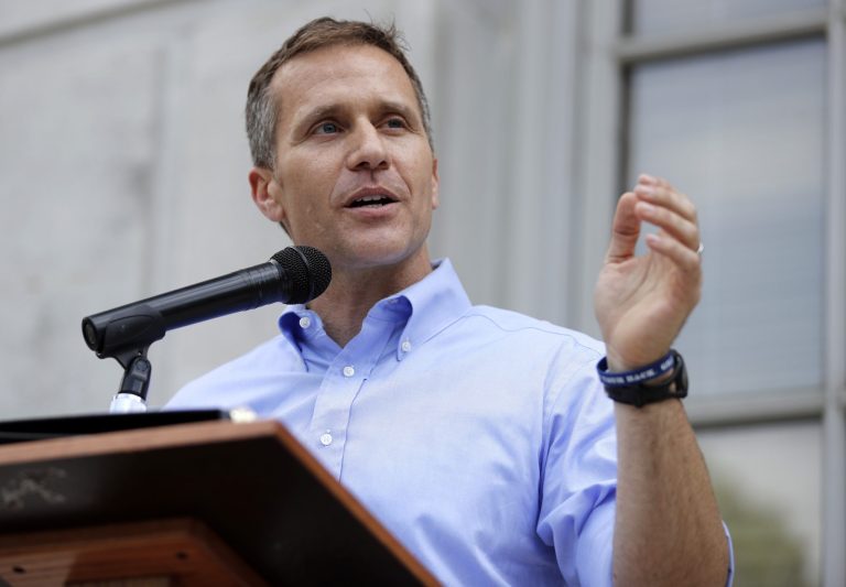 In this May 23, 2017, file photo, Missouri Gov. Eric Greitens speaks to supporters during a rally outside the state Capitol in Jefferson City, Mo.