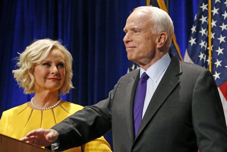 In this Tuesday, Nov. 8, 2016, file photo, Sen. John McCain, R-Ariz., right, pauses as his wife, Cindy McCain, looks at him on stage after giving his victory speech as he announces his win over Democratic challenger Rep. Ann Kirkpatrick, in Phoenix.