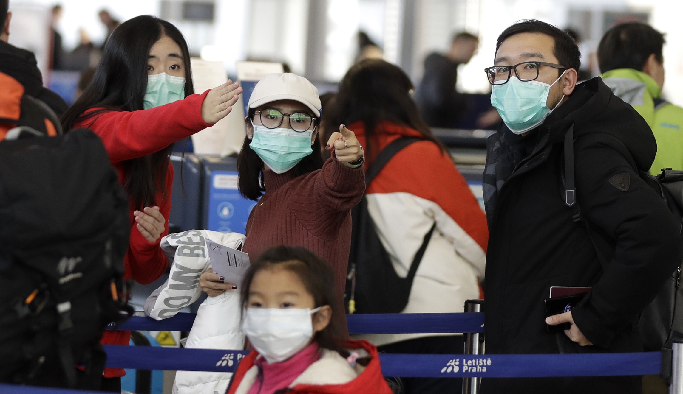 As coronavirus spreads, Trump’s travel ban may be helpful